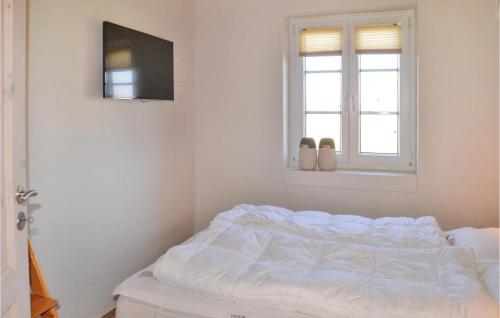 Katil atau katil-katil dalam bilik di Holiday Home Tarm With Fireplace 07