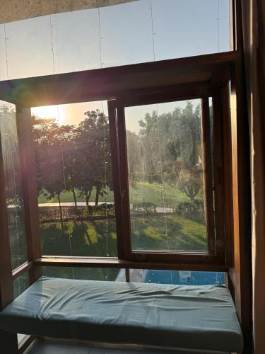 Ένα ή περισσότερα κρεβάτια σε δωμάτιο στο BK's Villa Golf View