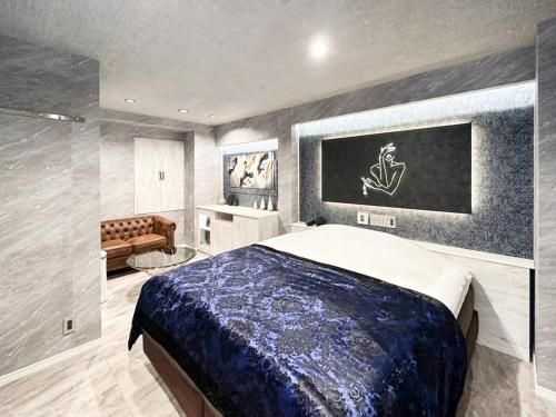 Una cama o camas en una habitación de Hotel ZALA