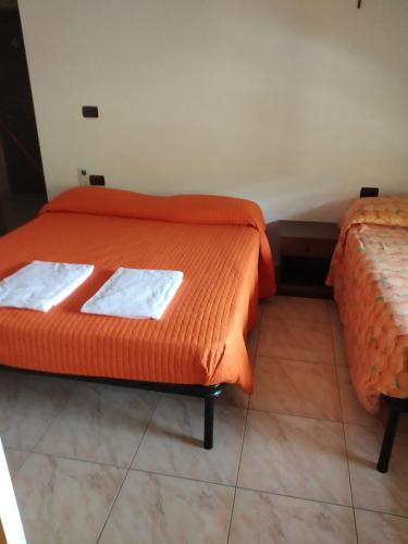 Postel nebo postele na pokoji v ubytování Agriturismo Casamia