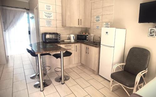 Kuchyň nebo kuchyňský kout v ubytování Ceelee's Place