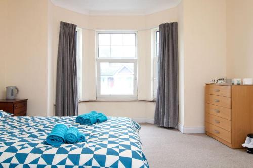 Ένα ή περισσότερα κρεβάτια σε δωμάτιο στο Darwin road guest house room 2
