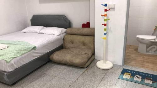 Postel nebo postele na pokoji v ubytování Baan1668 Hometel near Chinatown One Bangkok
