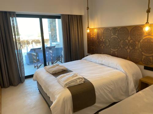 Gallery image of Helios Beach Hotel & Bungalows in Karpathos Town
