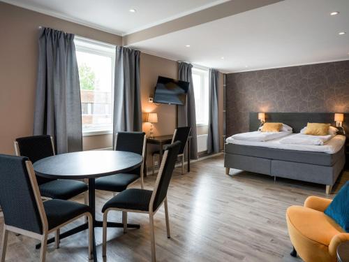 Postel nebo postele na pokoji v ubytování Comfort Hotel Finnsnes