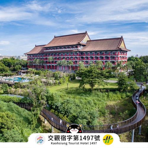 a resort with a large building with a garden at The Grand Hotel Kaohsiung in Kaohsiung