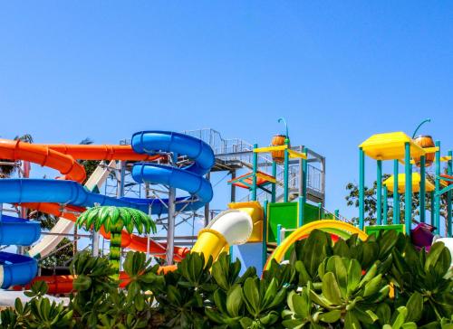 a water park with a colorful water slide at Melia Casa Maya Cancun All Inclusive in Cancún