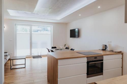 Kuchyň nebo kuchyňský kout v ubytování Apartmány Paľovci