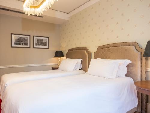 Ebel Boutique Hotelにあるベッド