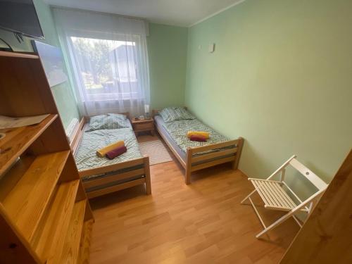 Katil atau katil-katil dalam bilik di Ferienwohnung im Plenter