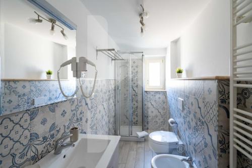 Kúpeľňa v ubytovaní Homiday - Residenza D'Annunzio