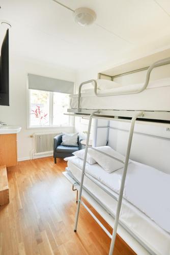 Ein Bett oder Betten in einem Zimmer der Unterkunft Mullsjö Hotell & Konferens