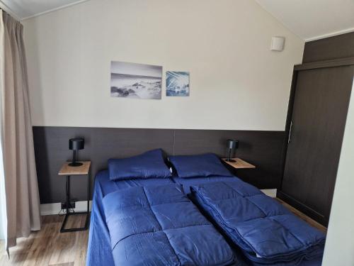 Ένα ή περισσότερα κρεβάτια σε δωμάτιο στο De Stamper - Chalet 418