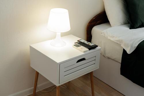 Llit o llits en una habitació de LuxRent Park