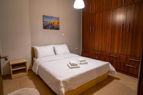 Giường trong phòng chung tại Feel Greek Hospitality #Θ012