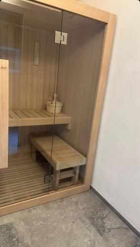 a closet with wooden shelves in a room at La Vecchia cantina Guzzardi in Lari