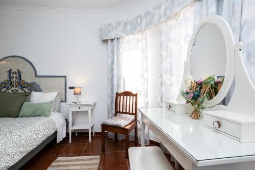 Кровать или кровати в номере Parque dos Reis Apartment 2