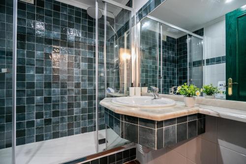 Ванная комната в Parque dos Reis Apartment 2