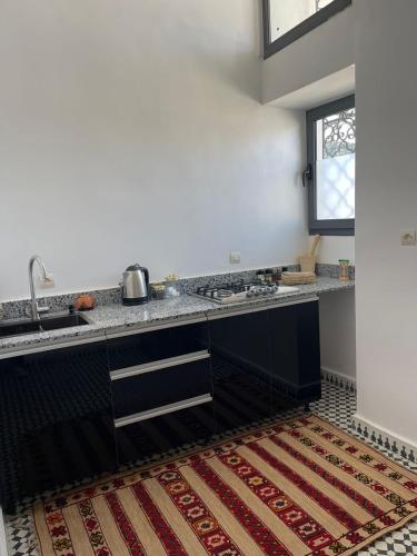Una cocina o cocineta en Appartement Fatima