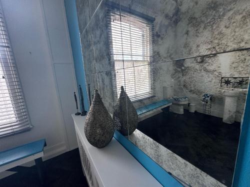 O baie la Botanicals Town House