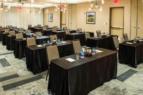a conference room with tables and chairs in it at Cambria Hotel McAllen Convention Center in McAllen