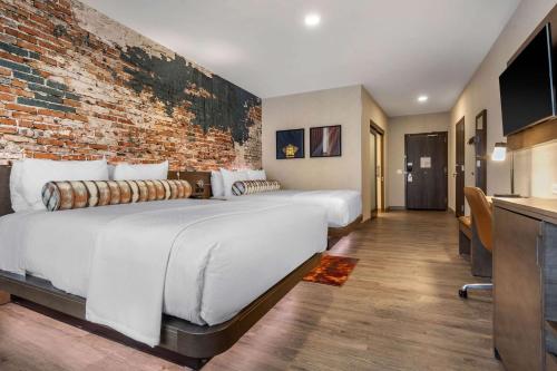 Ένα ή περισσότερα κρεβάτια σε δωμάτιο στο Cambria Hotel Omaha Downtown