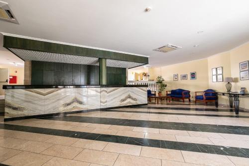 Лобби или стойка регистрации в Parque dos Reis Apartment 2