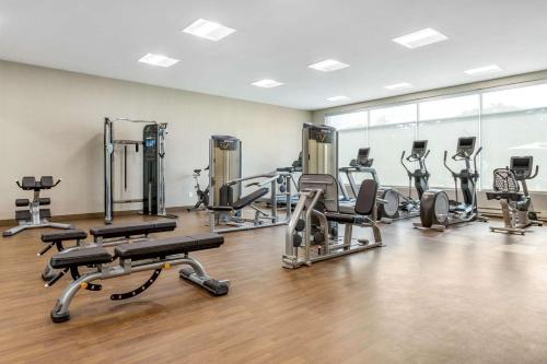 a gym with several treadmills and cardio machines at Cambria Hotel Fort Mill in Fort Mill