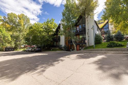 a house on the side of a street at Renovated 2 BR Aspen Condo Ski-in out in Aspen