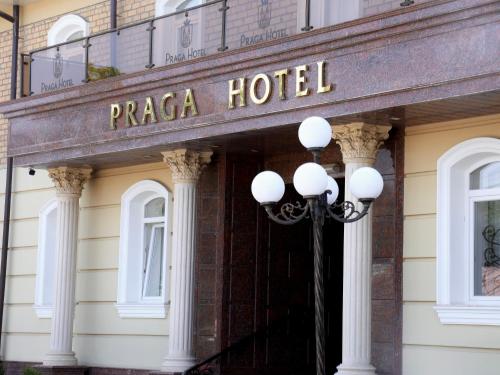 a street light in front of a hotel at Praga Hotel in Tashkent