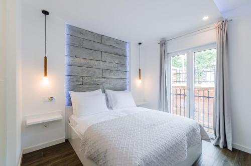 En eller flere senge i et værelse på Palace Paulina 3A