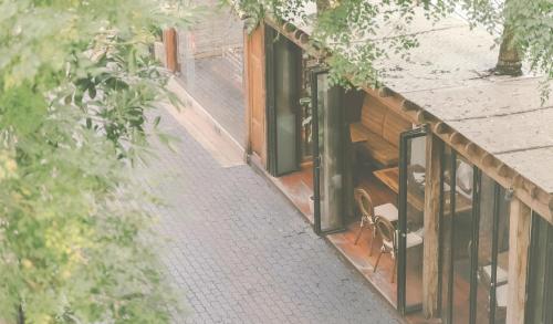an overhead view of a house with a porch at Yesterday Hotel in Chiang Mai
