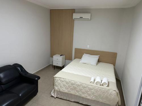 Ένα ή περισσότερα κρεβάτια σε δωμάτιο στο Big Hotel