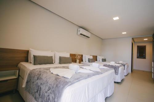 Postel nebo postele na pokoji v ubytování Oiti Beach Resort Tutoia