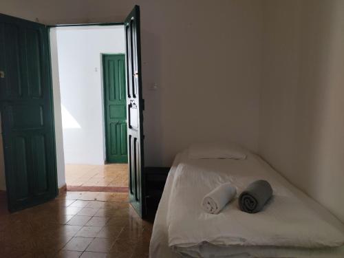 Ένα ή περισσότερα κρεβάτια σε δωμάτιο στο La Casita