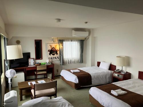 Postel nebo postele na pokoji v ubytování Sky Heart Hotel Koiwa