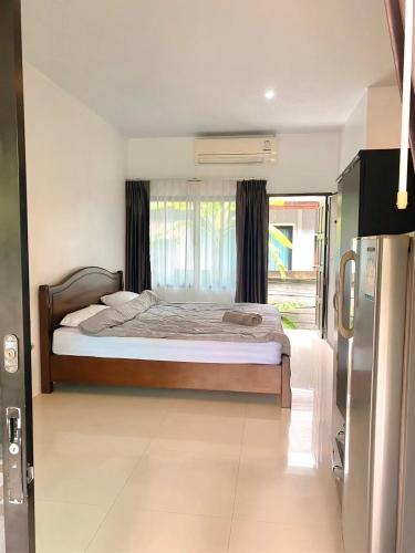 Postel nebo postele na pokoji v ubytování Share pool 1 room 2 bedroom