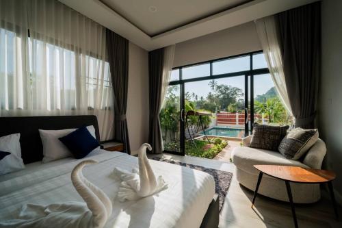 O zonă de relaxare la Pool Villa Alawan Krabi Klong Muang R1