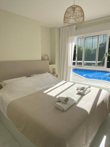 Ένα ή περισσότερα κρεβάτια σε δωμάτιο στο Casa Bendita - LUXURY APARTMENT BENIDORM