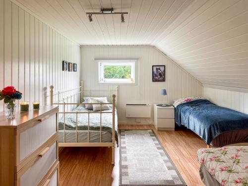 Postel nebo postele na pokoji v ubytování Holiday Home Rødehuset by Interhome