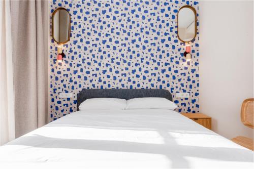 Letto o letti in una camera di Smartr Malaga Centro