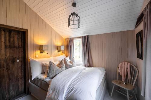Postel nebo postele na pokoji v ubytování Nusfjord Village & Resort