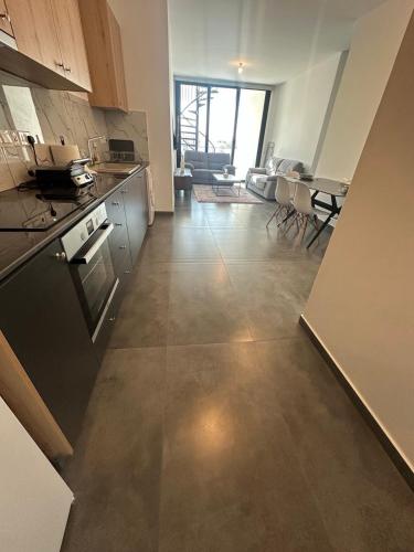 Η κουζίνα ή μικρή κουζίνα στο Luxurious two bedroom apartment with roof garden