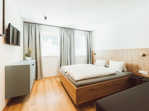 Ένα ή περισσότερα κρεβάτια σε δωμάτιο στο Apartment Himmelraich by Interhome