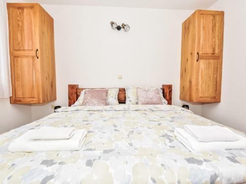 Postel nebo postele na pokoji v ubytování Holiday Home Lea by Interhome