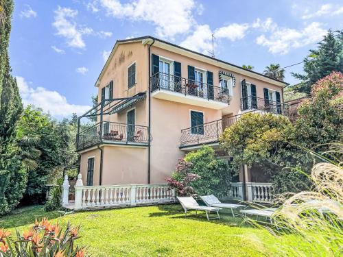 an exterior view of a house with a yard at Apartment Il Risveglio-4 by Interhome in Gorleri