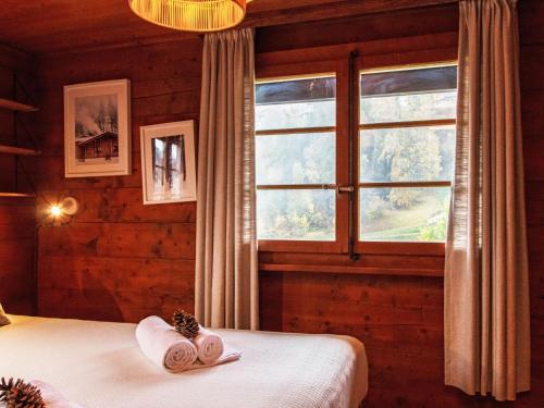 Postel nebo postele na pokoji v ubytování Chalet Chalet Derborence by Interhome