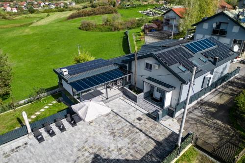 an aerial view of a house with solar panels on it at Relax house MAROKIS in Karlovac