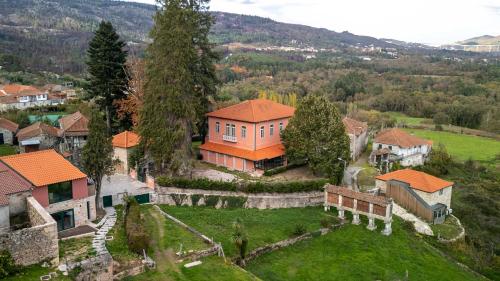 an aerial view of a house in a village at Quinta da Janeca in Vila Pouca de Aguiar