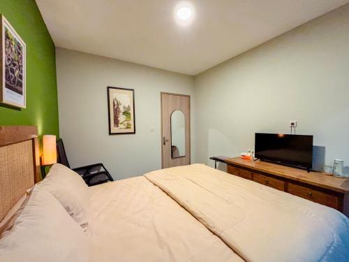 Postel nebo postele na pokoji v ubytování Locus Coliving